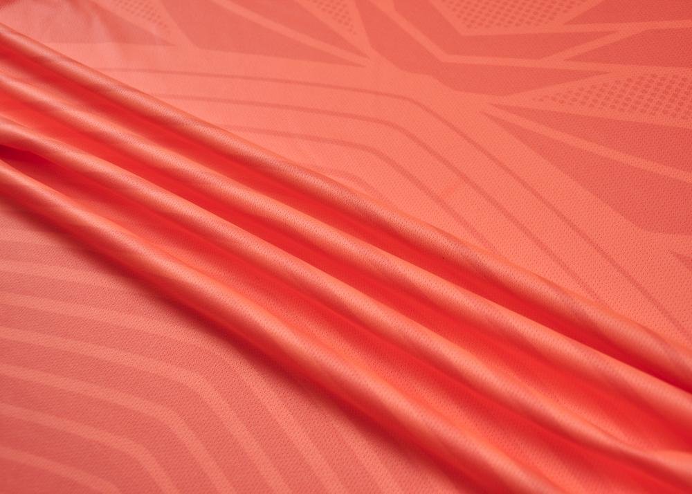 Close-up factory photo of premium grade Orange soccer uniform set by professional wholesale soccer jerseys (1)