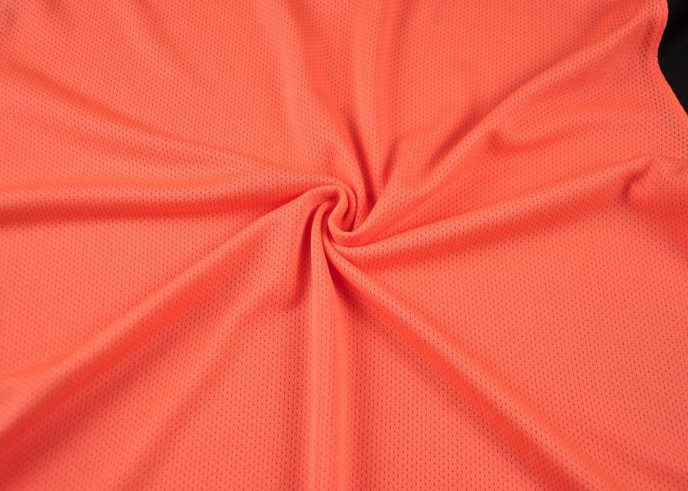 Close-up factory photo of premium grade Orange soccer uniform set by professional wholesale soccer jerseys (5)