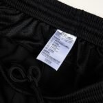 Close-up factory photo of pro-grade 150gsm pinhole mesh soccer uniform set by professional wholesale soccer jerseys