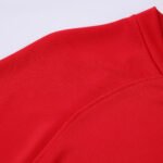 Close-up factory photo of sublimated Red soccer uniform set by professional wholesale custom soccer jerseys (3)
