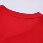 Close-up factory photo of sublimated Red soccer uniform set by professional wholesale custom soccer jerseys (6)