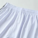 Close-up factory photo of thai-quality polo collar White soccer uniform set by professional wholesale soccer jerseys