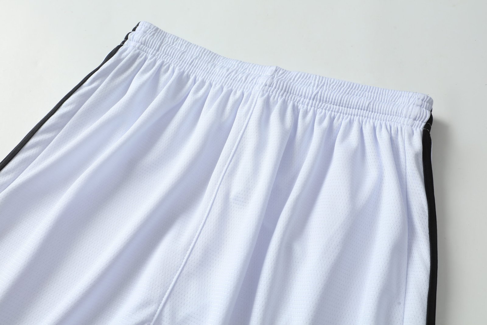 Close-up factory photo of thai-quality polo collar White soccer uniform set by professional wholesale soccer jerseys