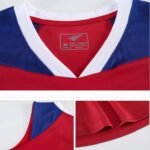 Close-up of basketball jersey V-neck collar with inner lining and size tag detail