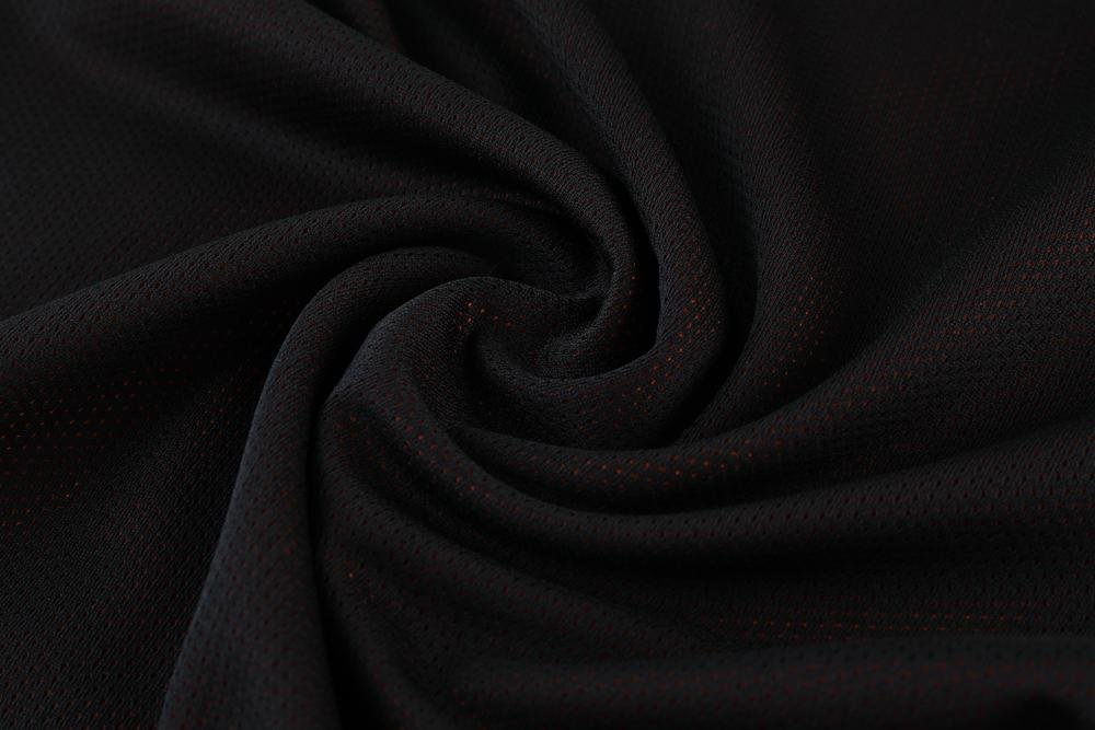 Black breathable mesh fabric close-up for basketball uniforms