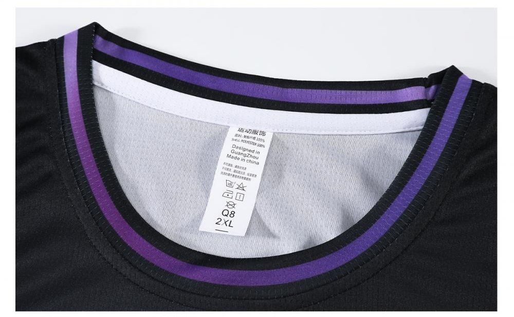 Black basketball jersey collar with purple trim and clothing size tag
