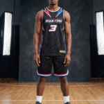 Man wearing black zebra pattern reversible basketball jersey with Shanying 3