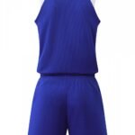 Back view of blue basketball uniform with white and red accents