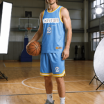Man holding basketball in light blue and yellow custom