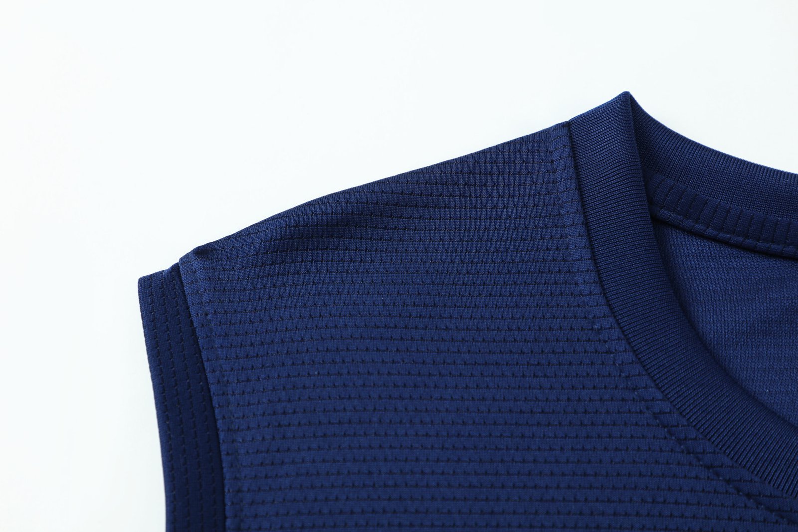 Sublimated black soccer jersey mockup with classic crew-neck and raglan sleeves for wholesale custom soccer jerseys.