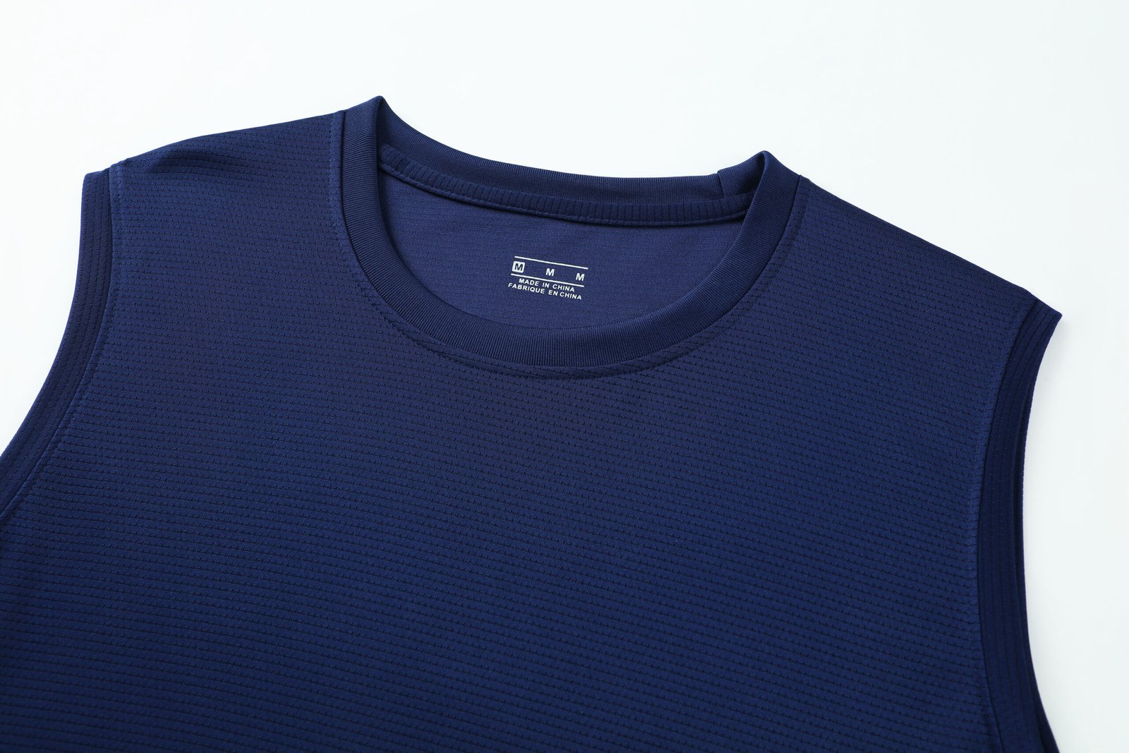 Close-up-premium-grade-ribbed-crew-neck-set-in-sleeves-black-soccer-factory-photo