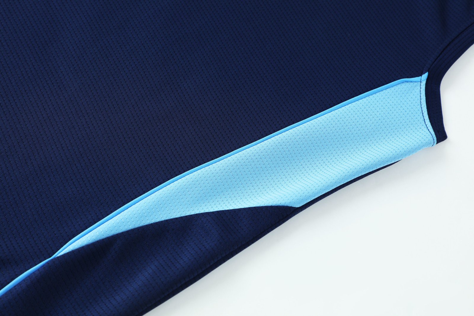 Close-up premium-grade-ribbed-crew-neck-set-in-sleeves-black-soccer-factory-photo