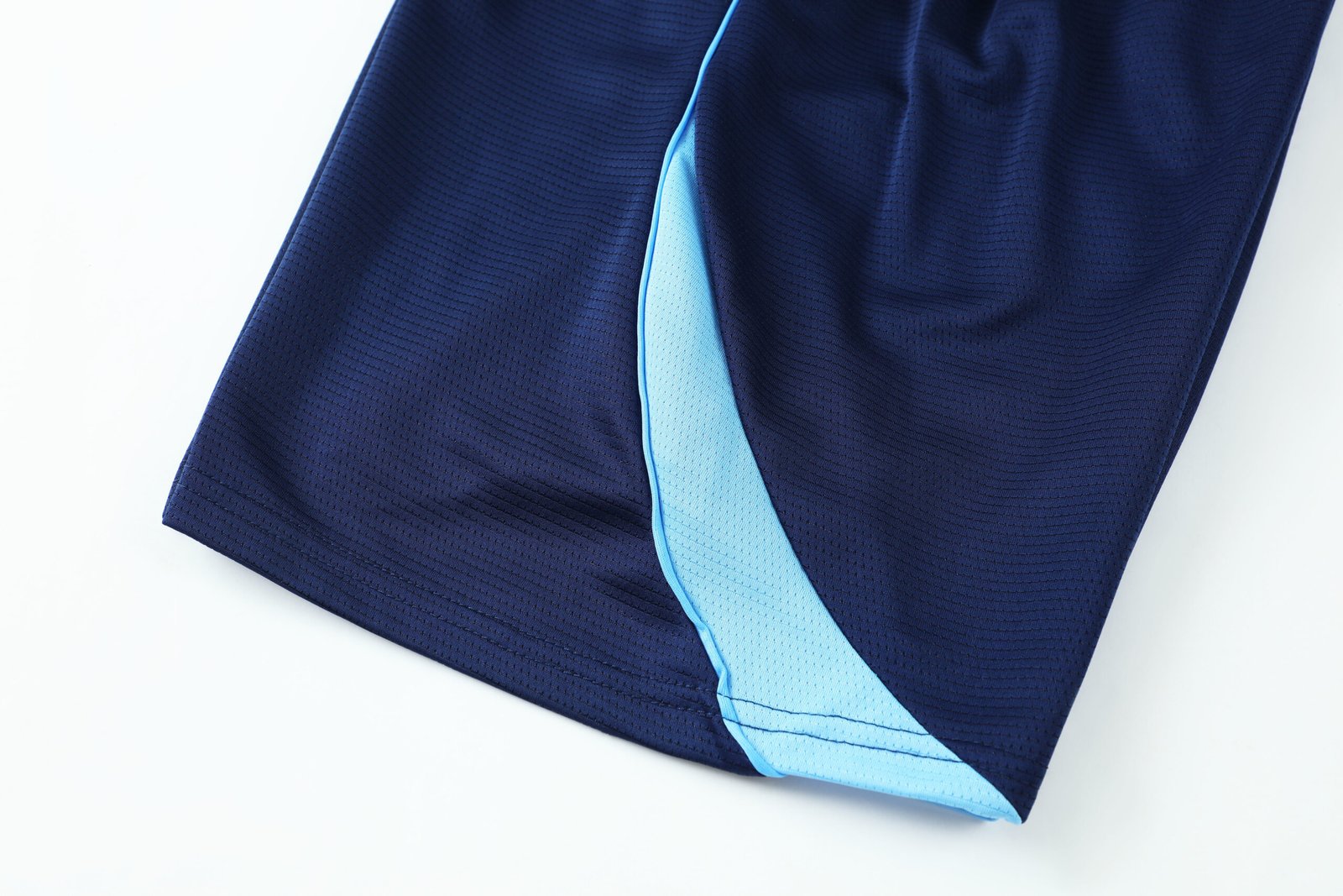 Close-up factory photo of thai-quality soccer uniform set by professional wholesale soccer shorts
