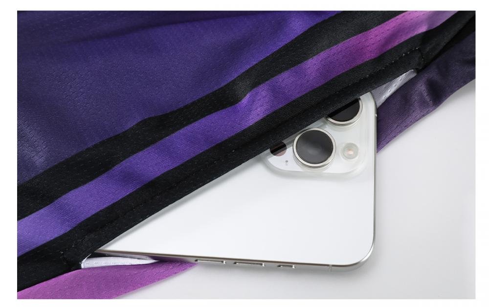 Purple and black basketball uniform fabric with phone pocket size demonstration