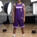Man modeling purple sublimation custom basketball jersey with number 3