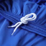 Sublimated Blue soccer shorts photo with overlapping v-neck and raglan sleeves for soccer jersey manufacturer.