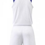 Back view of white basketball uniform with blue and red details