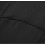 Close-up of black compression fabric with flatlock stitching and panel design