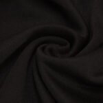 Close-up of soft black fabric texture for jogger sports pants