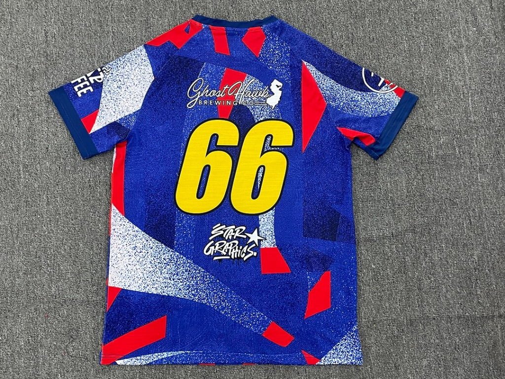 Blue full sublimation soccer jersey back view with yellow number 66