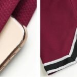 Front view of maroon mesh basketball shorts with side pockets