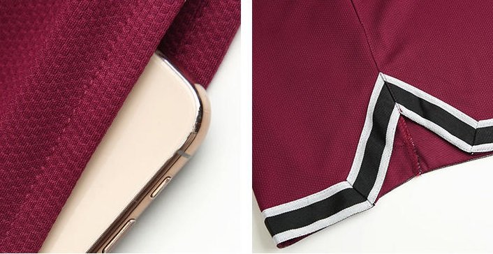 Front view of maroon mesh basketball shorts with side pockets
