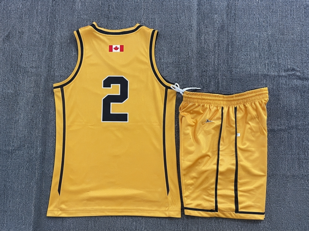 Womens yellow reversible basketball jersey and shorts set back view with number 2
