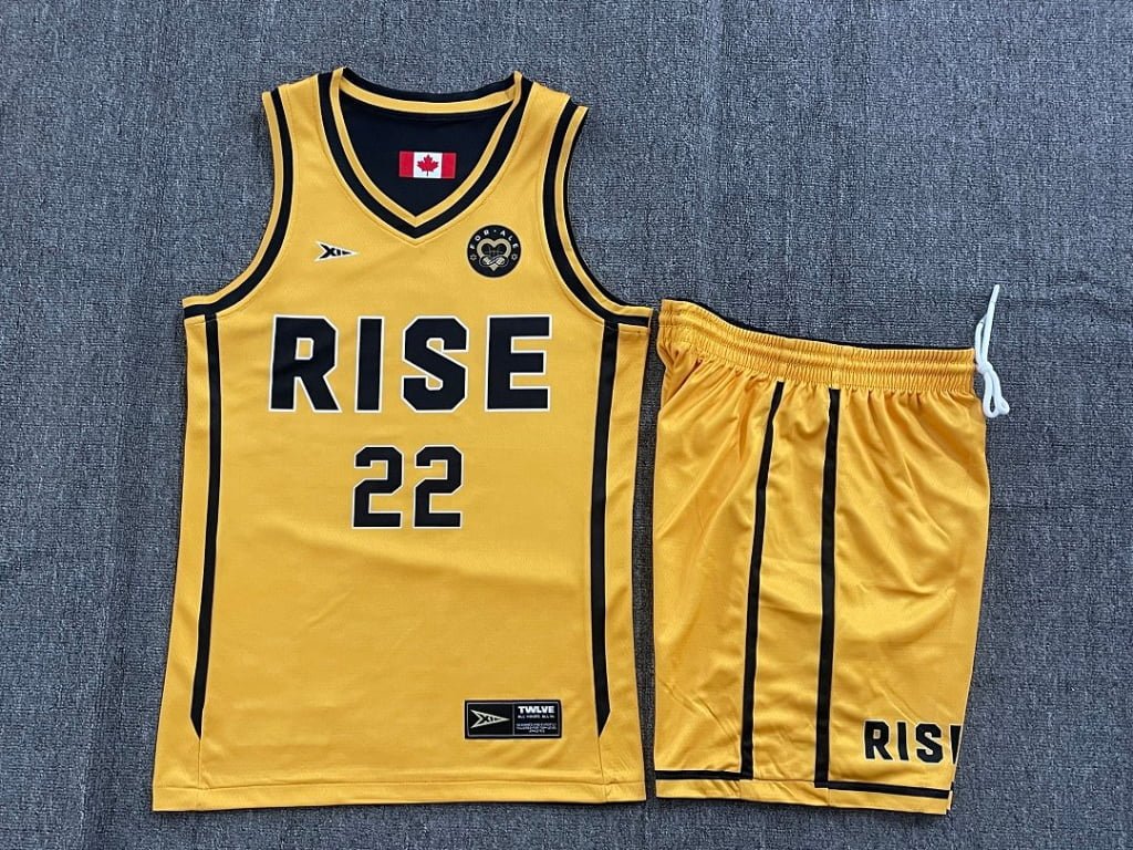 Womens yellow reversible basketball jersey and shorts set front view with RISE 22