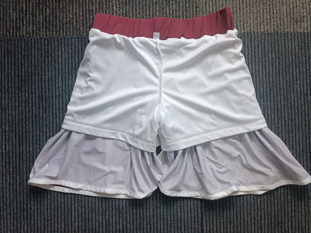 Interior view showing soft white built-in compression shorts for coverage and support.