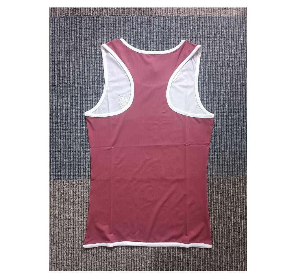 Rear view of women's tennis racerback tank top featuring white contrast trim and breathable cut-out design.